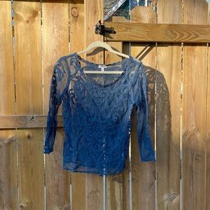 Beautiful sheer periwinkle blue top.